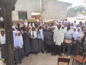 DRT's staff with students after pads distribution