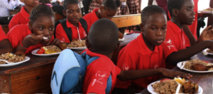Students eating in the canteen.