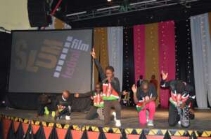 Kids performing at Slum Film Festival ceremony