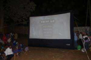 Outdoor community screening in Kibera, Nairobi