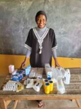 Teacher with first aid kit.