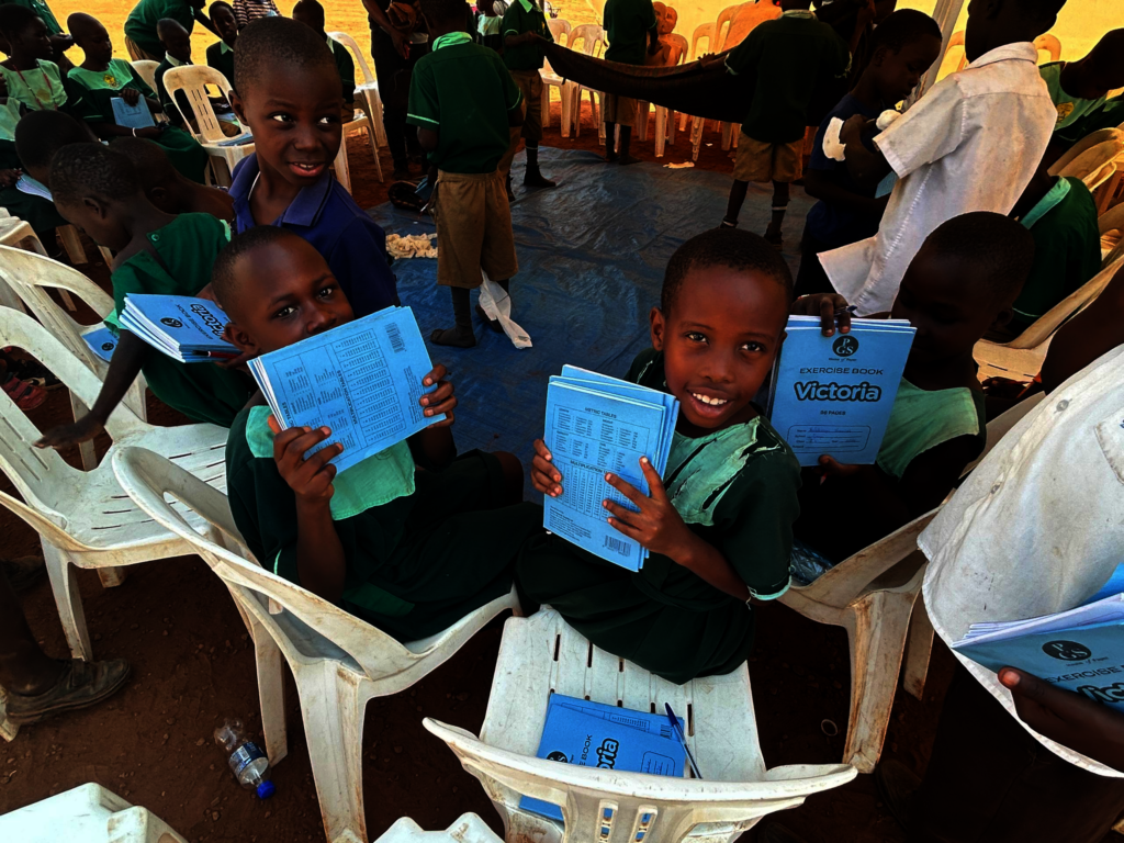 Children Looking Happy with their Donated Books.