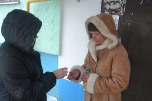 Angela Gives TB Medicine to Aliona