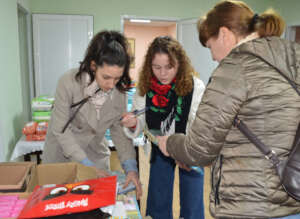 Damiana, Madalina & Irina Prepare Folders