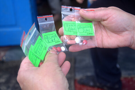 Elena Sorts TB Medicine Bags for Each Child