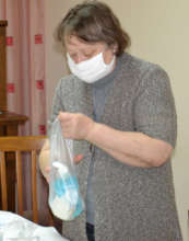Feodora Prepares Sanitary Packet