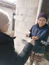 Lydia Gives Viorica TB Medicine