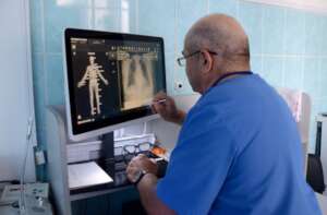 Radiologist Reviews X-ray in Ungheni