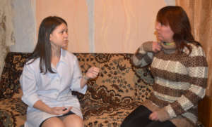 Anna Points to Shoulder Pain, a Side Effect