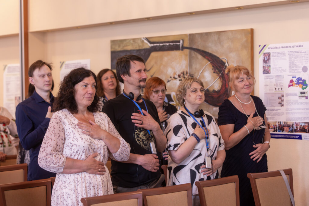 Attendees Practice Breathing Exercises
