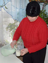 Claudia Pouring Milk