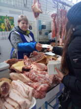 Student Explains TB to Meat Vendor