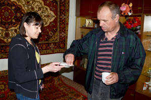 Igor takes TB drugs from Liudmila