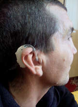 Serghei with hearing aid