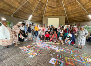 The Malungeni teachers reviewing their artworks.
