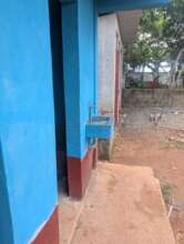 Front of the bathroom building, handwash station