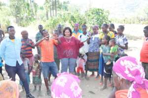 MHO Executive Director with beneficiarie in area