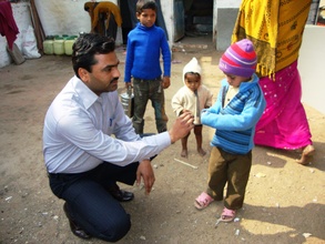 A child getting Directly Observed Therapy
