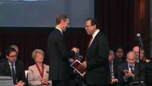 Mr. Sandeep Ahuja receiving Public Service Award