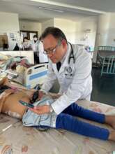 Doctors performing medical exams