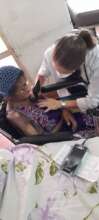 Doctors performing medical exams
