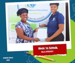 A parent receiving school fees loan check