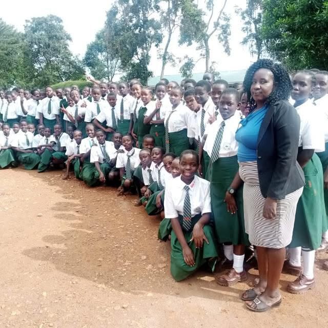 Girls lining up in new school Unforms