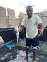 Project leader in Tarpaulin Thank with fish