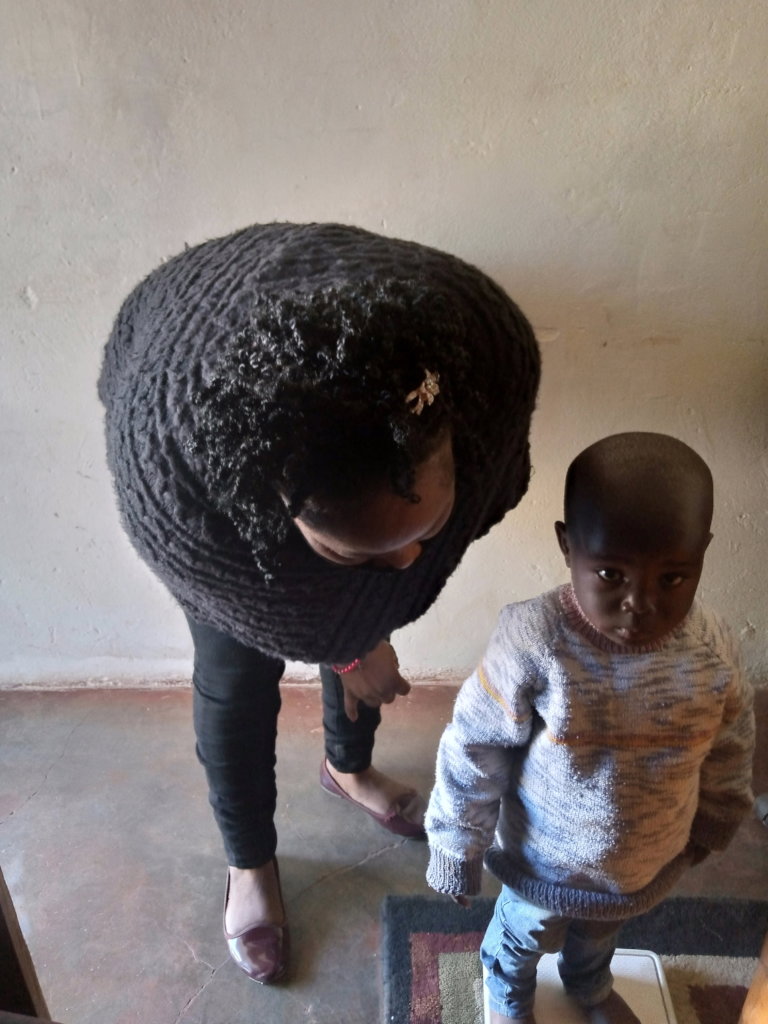 A toddler undergoing a routine health check-up