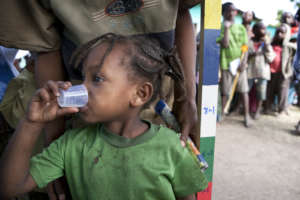 Girl takes annual antibiotic to treat Trachoma