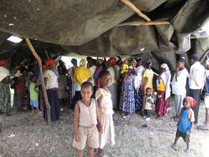 Villagers gather to receive the antibiotic