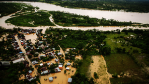 Heavy rains and river overflow and flooding town