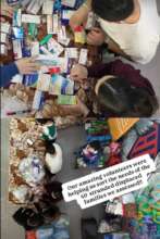 Sorting donations with our volunteers!