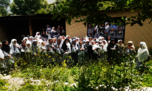 Girls in front of their new school, May 16, 2004