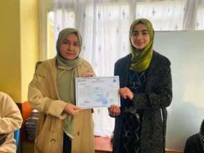 Beshra (right) with her teacher Muslima.