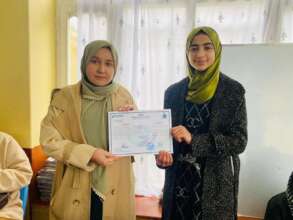 Bushra with her teacher