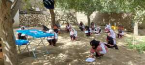 Photo 2: girls studying outside