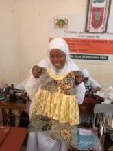 Tailoring student shows her work