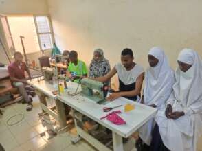 Leatherworking students learn to sew leather