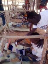 Weaver and young student in Lakatone