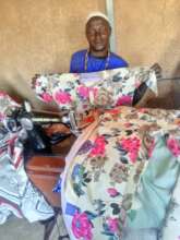 Tailoring student shows his work