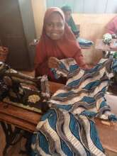 Student at CNRFO with her work