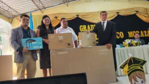 Edel and Minsis donating equipment at Graduation
