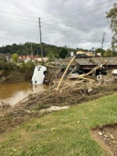 Towns still littered with debris