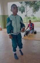 Innocent is now walking independently