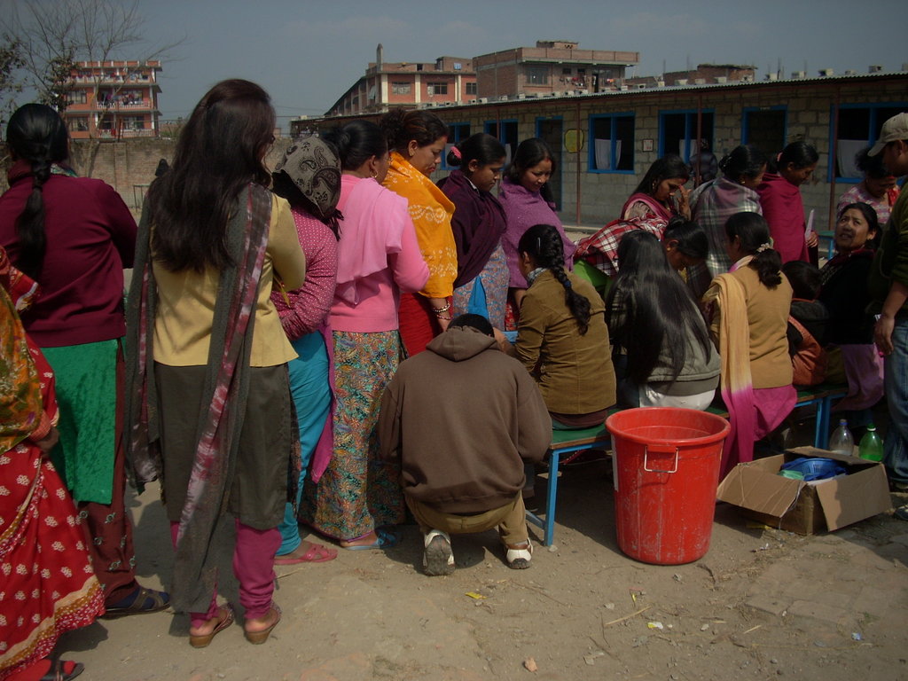 Women completing registration