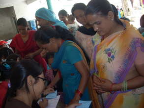 Women completing registration