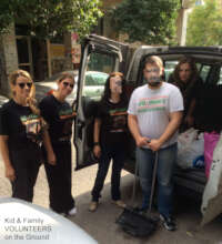 HUG POINTS volunteers transfer victims and goods