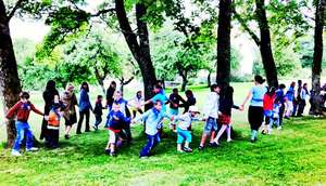 Kids Playing With Volunteers