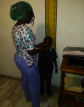 Nurse tracking a child's development